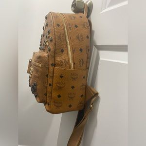Mcm bookbag brown with studs.This bag is still in excellent condition